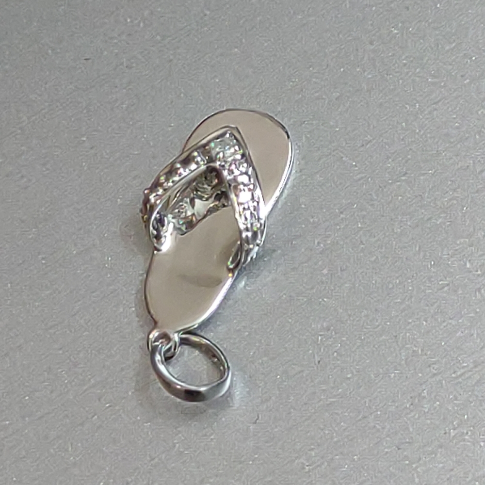10K .01ct diamond white gold flip flop Pendant